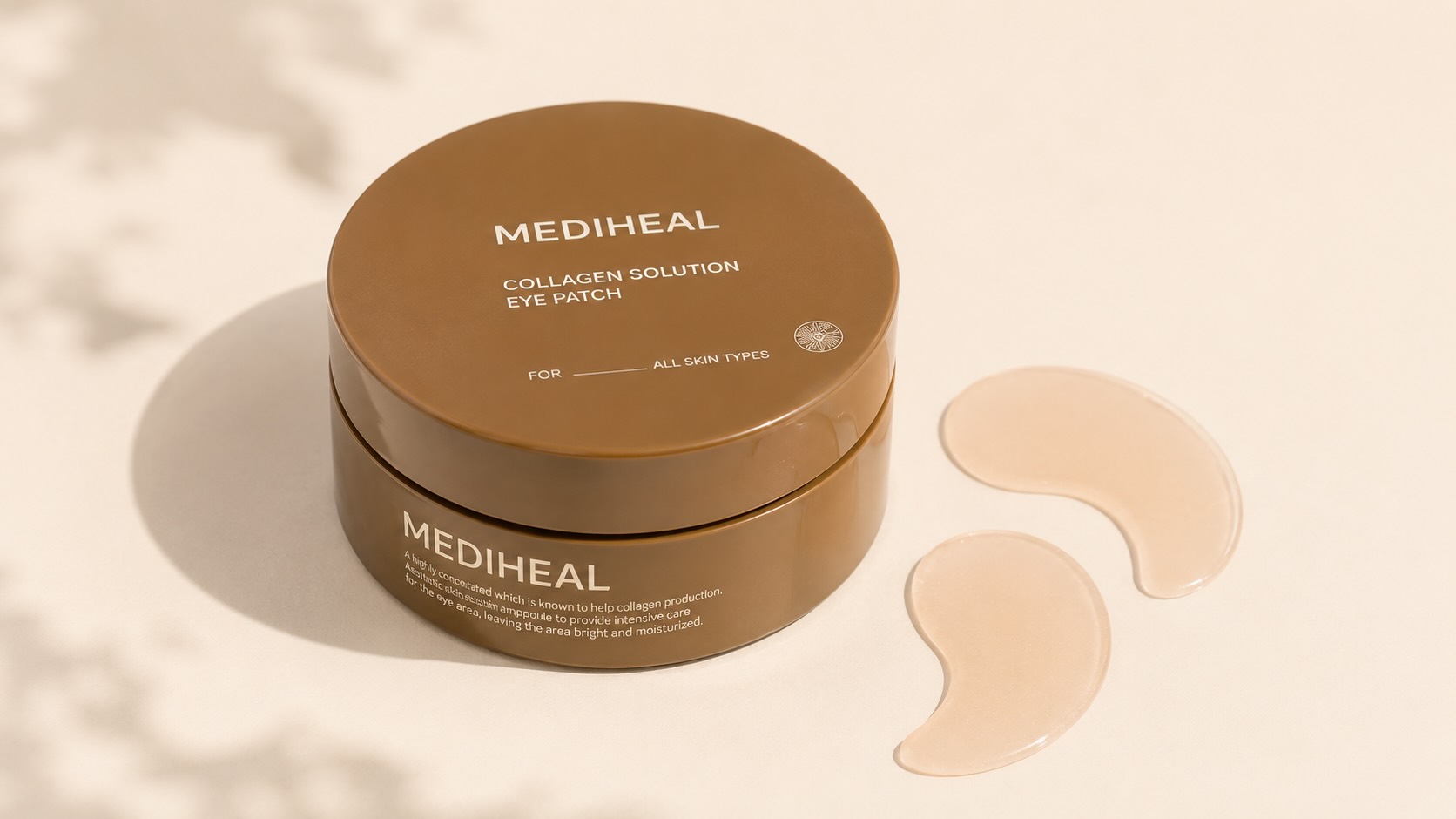 MEDIHEAL Collagen Solution Eye Patch jar with hydrogel crescent patches on neutral background