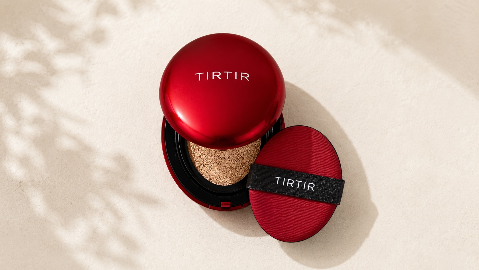 TIRTIR Mask Fit Red Cushion red compact case on neutral cream background with minimalist styling