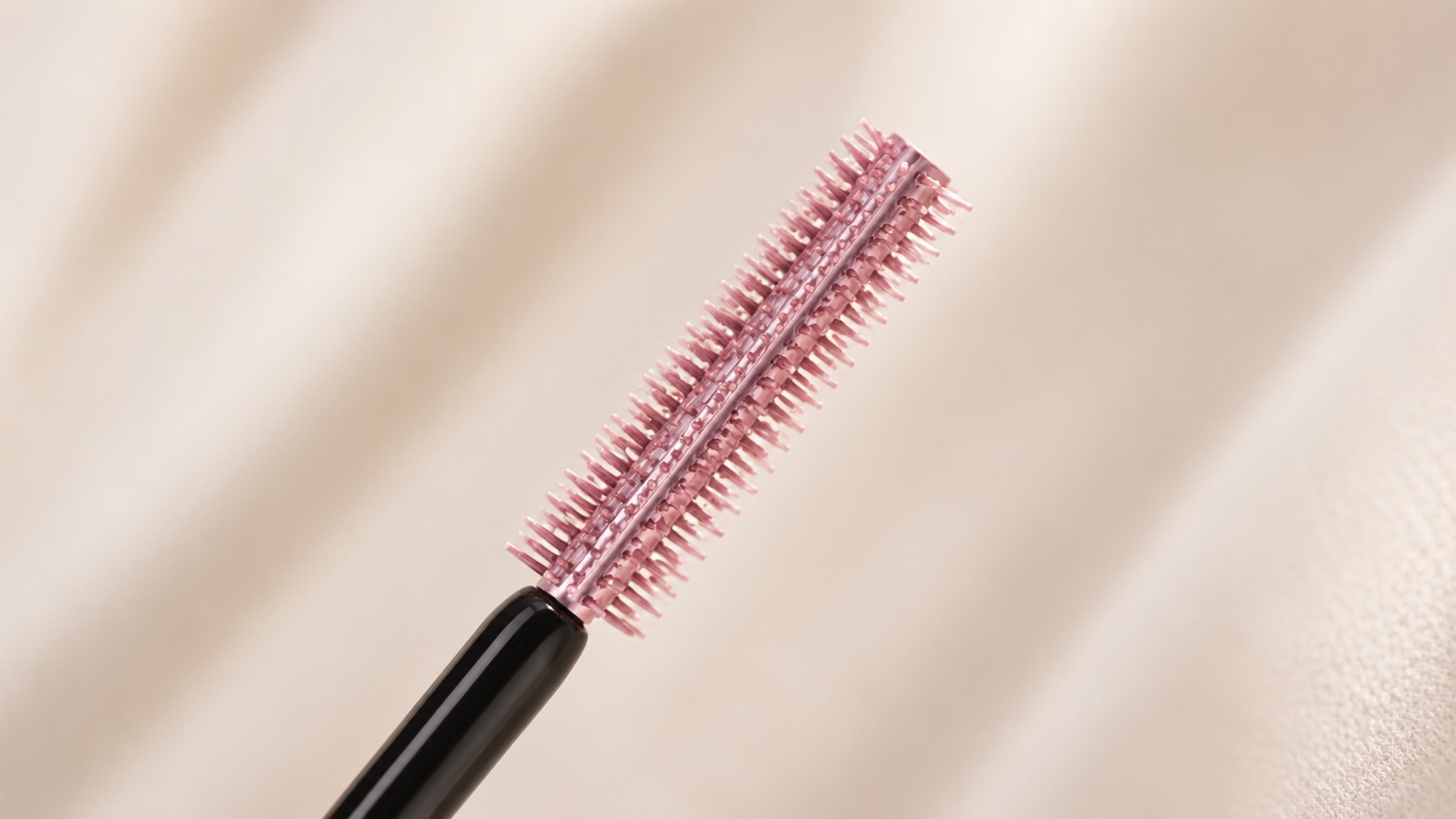 Maybelline Sky High Mascara flexible wand close-up showing the long flexible brush design