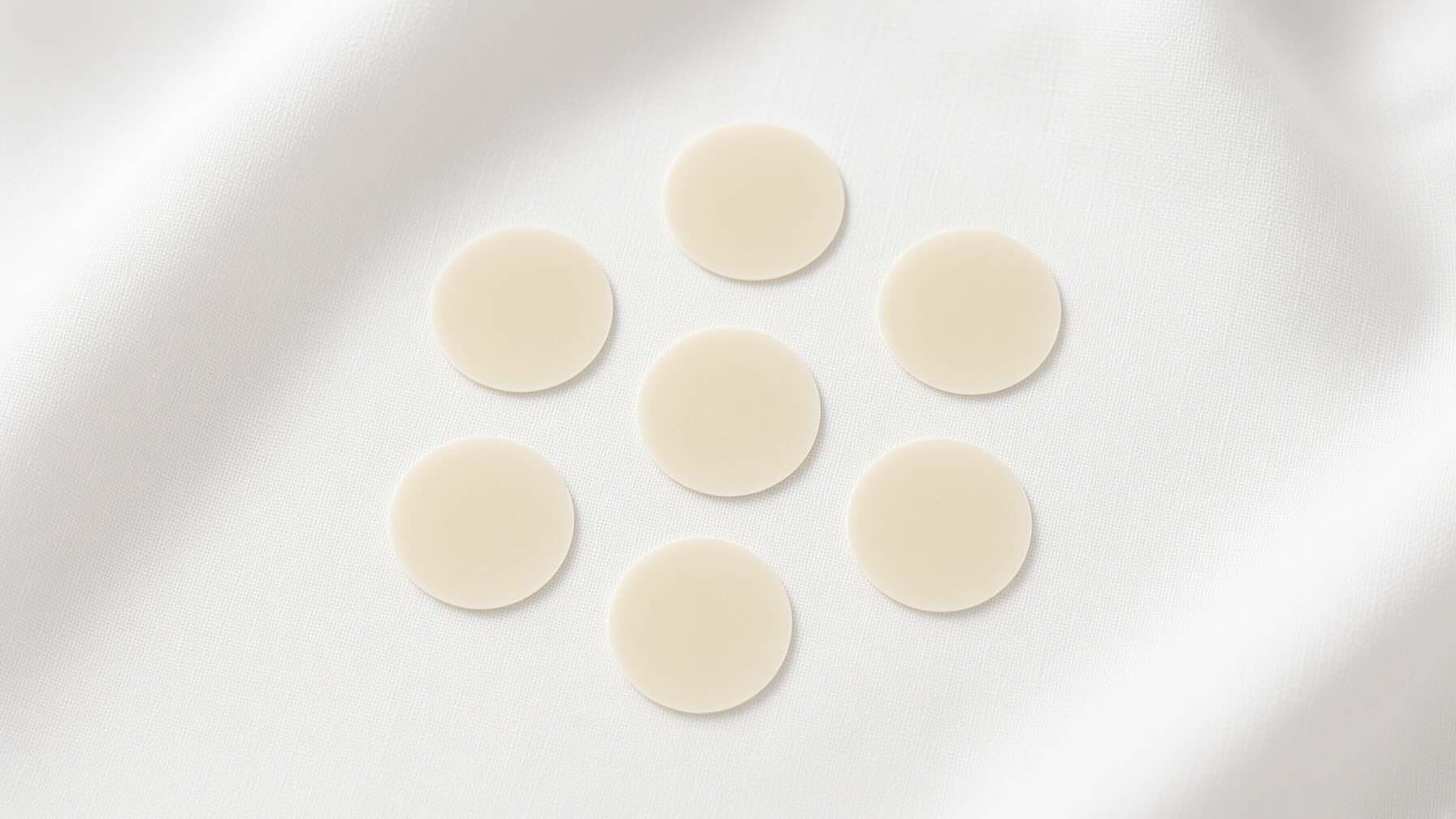 Hero Cosmetics Mighty Patch Original acne patches on neutral cream background with minimal styling