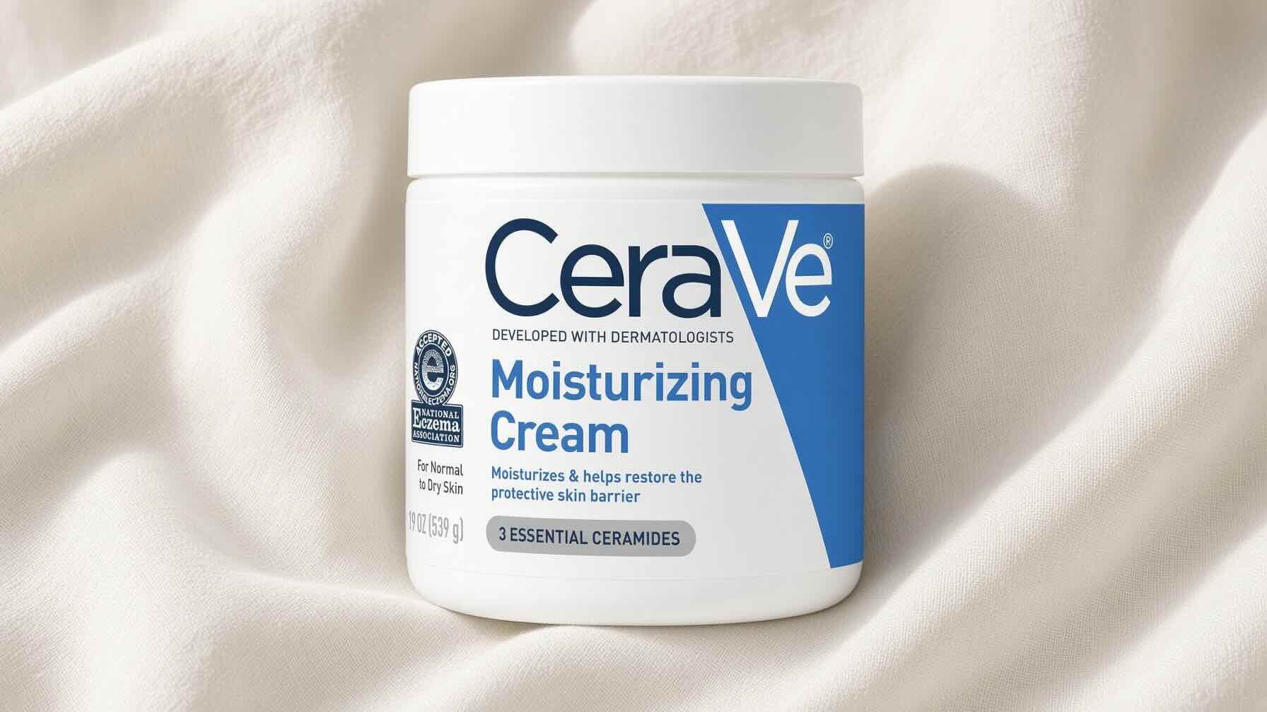 CeraVe Moisturizing Cream white tub on neutral cream background with clinical skincare styling